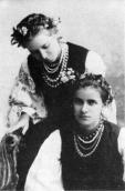 With her sister Olga, 1896